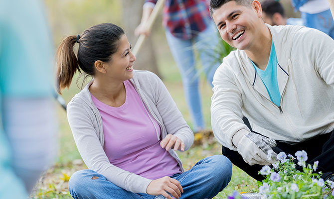 People chatting at a community event