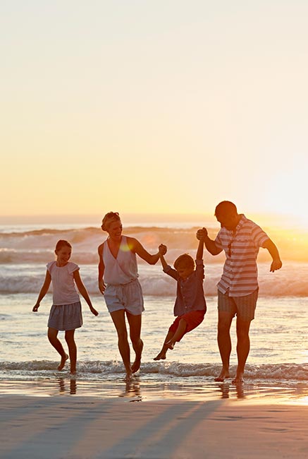 Family on vacation at a beach