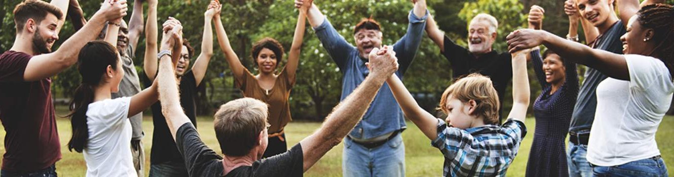 a group of people in a circle holding hands