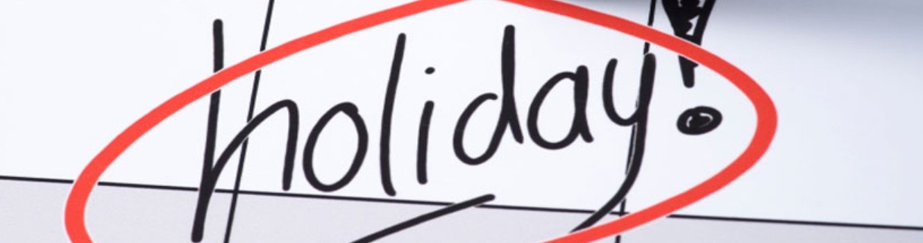 the word Holiday circled on a calendar