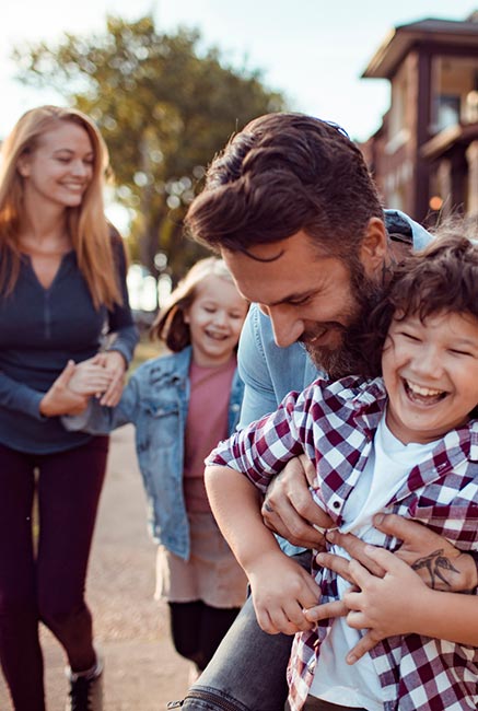 Family going on a walk in the community